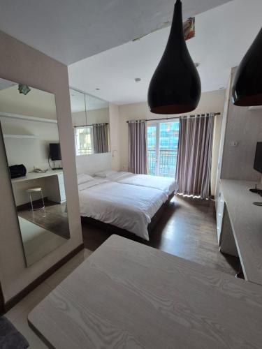 Katil atau katil-katil dalam bilik di Studentpark Apartmen By Jia Room