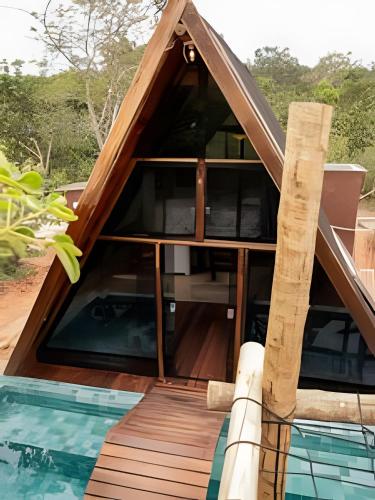 a view of a house with a swimming pool at Espaço Gaia in Santana do Riacho