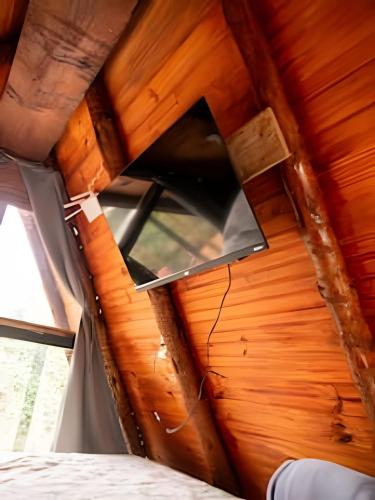 a view of a window in a wooden ceiling at Espaço Gaia in Santana do Riacho