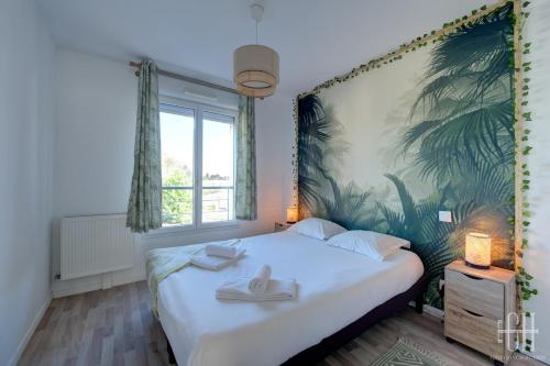 Postel nebo postele na pokoji v ubytování Le St Côme - 4V - 2 chambre - Proche Tours Centre