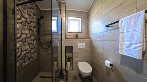 Koupelna v ubytování Pera Apartments