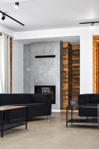 Posezení v ubytování Pera Apartments