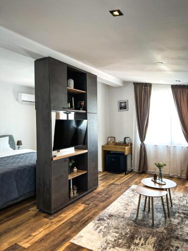 Postel nebo postele na pokoji v ubytování Pera Apartments