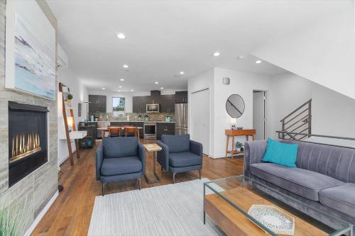 a living room with a couch and two chairs at Golden Gardens Getaway-Walk to Beach & Waterfront in Seattle