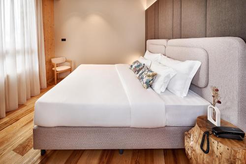 Katil atau katil-katil dalam bilik di The Log Porto Hotel by Piamonte Hotels