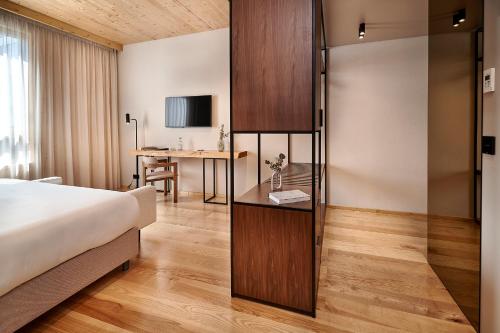 Katil atau katil-katil dalam bilik di The Log Porto Hotel by Piamonte Hotels