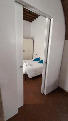 an open door to a bedroom with a bed at Agriturismo Amici Miei in Marliano