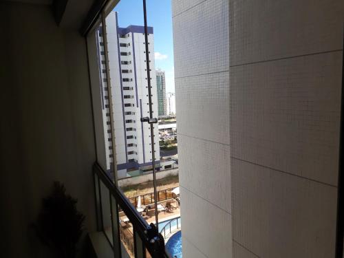 a view of a city from a balcony of a building at Imprensa III · Comfort and family in Brasilia in Brasilia