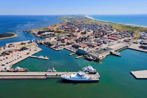 an aerial view of a harbor with a cruise ship at 9929-Hvide-Sande-Langsand-194-stuen in Hvide Sande