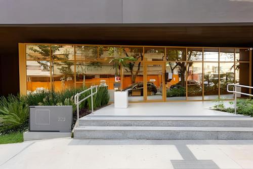 a building with stairs in front of a building at Today Perdizes in Sao Paulo