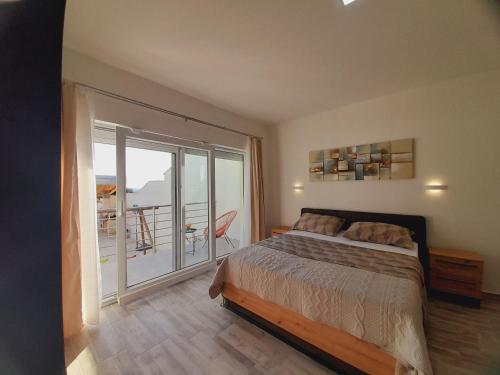 Ένα ή περισσότερα κρεβάτια σε δωμάτιο στο Villa Iva