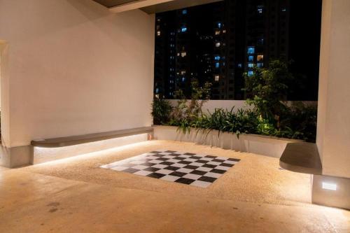 a chess board in a room with a window at Spacious 3BR Luxury Apartment Trizen Colombo 2 Near City Centre in Colombo