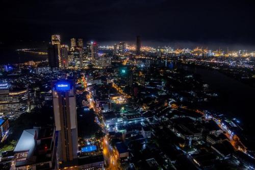 a view of a city at night with lights at Spacious 3BR Luxury Apartment Trizen Colombo 2 Near City Centre in Colombo