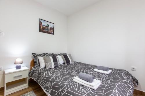 Postel nebo postele na pokoji v ubytování Apartman Marina