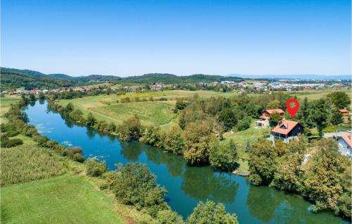 an aerial view of a river with a house at 3 Bedroom Cozy Home In Karlovac in Karlovac