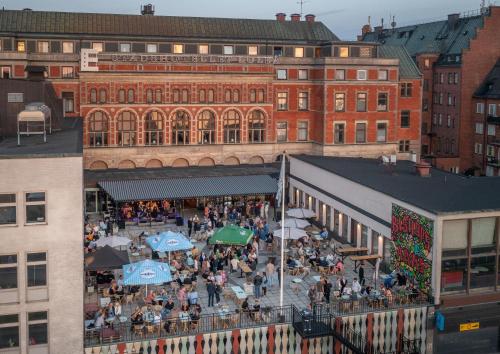 an overhead view of a crowd of people in a city at Elite Stadshotellet Luleå in Luleå