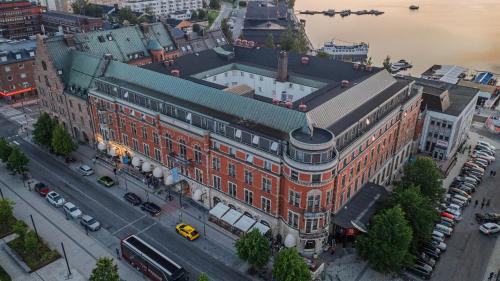 an overhead view of a large red brick building at Elite Stadshotellet Luleå in Luleå