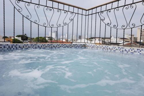 a hot tub on the roof of a building at Hotel Don Pedro De Heredia in Cartagena de Indias