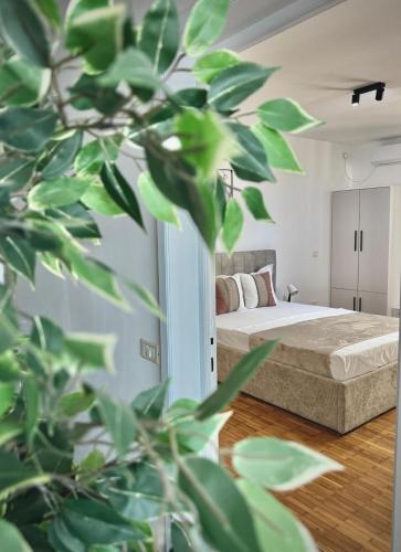 Ένα ή περισσότερα κρεβάτια σε δωμάτιο στο Vila One