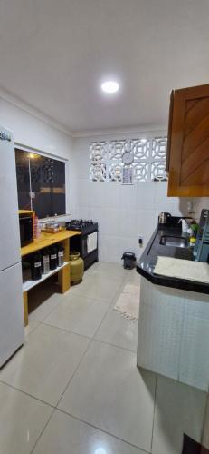 Kuchyň nebo kuchyňský kout v ubytování Praieira Pousada&Hostel