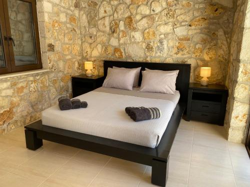 Postel nebo postele na pokoji v ubytování Magic Castle Villas