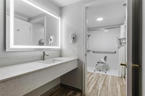 a bathroom with a sink and a mirror at Best Western Canton Inn in Canton