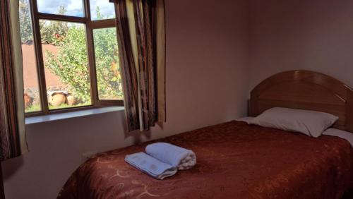 Cama o camas de una habitación en Casa Amaru Raqchi