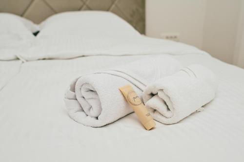 Una cama o camas en una habitación de Apartman Royal