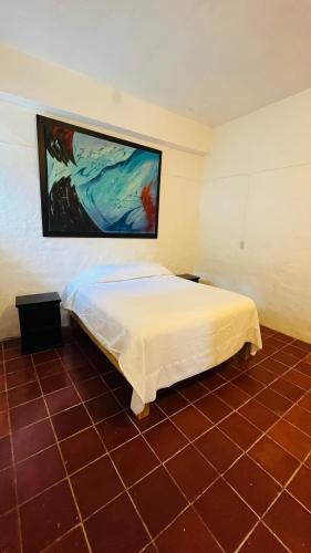 Ένα ή περισσότερα κρεβάτια σε δωμάτιο στο The Secret Room Hostel & Spa