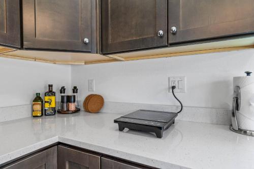 a kitchen with a counter top with a tray on it at Chimney Rock Suite - Unit C - Red Rock Retreat in Sedona