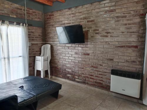 TV a/nebo společenská místnost v ubytování Soñada casa con Pileta Pedriel II