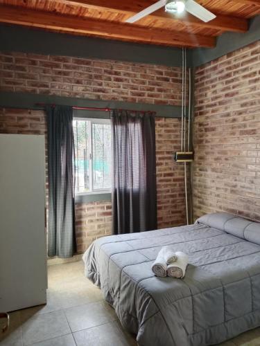 Postel nebo postele na pokoji v ubytování Soñada casa con Pileta Pedriel II