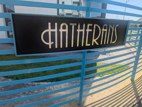 a sign for a chattanooga building at Portstewart Atlantic Cove Hatheran Gardens in Portstewart