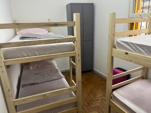 Postel nebo postele na pokoji v ubytování Ana Rosa estação Av Paulista
