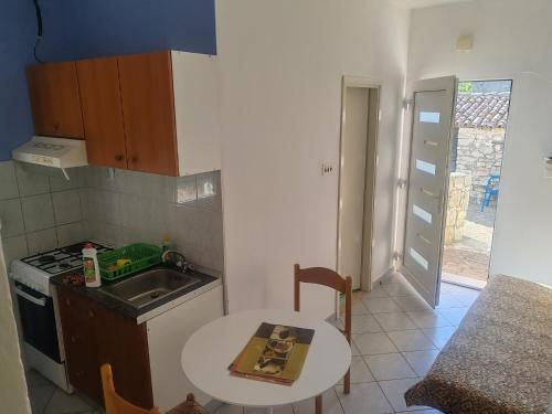 Dapur atau dapur kecil di Apartments with parking space Zman, Dugi otok - 449