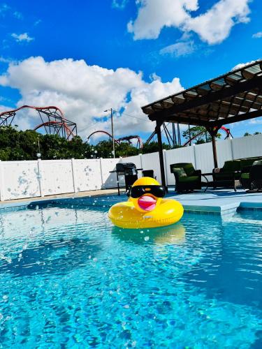 a yellow raft in the water in a swimming pool at Busch Gardens Deluxe Edition w/heatedpool in Tampa