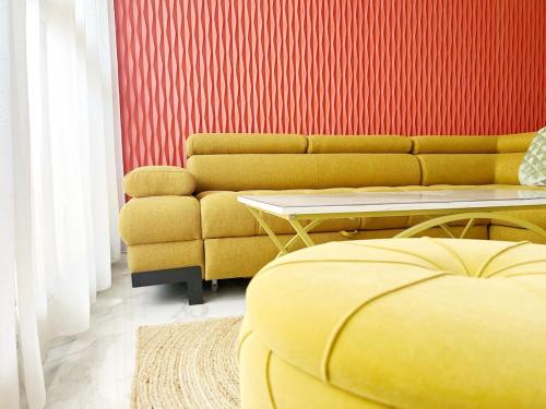 a living room with a couch and a table at Delrio in Nantes