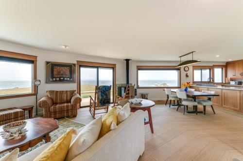 a living room with a couch and a table at Walk to Beach Luxury Oceanfront Escape in Caspar in Caspar