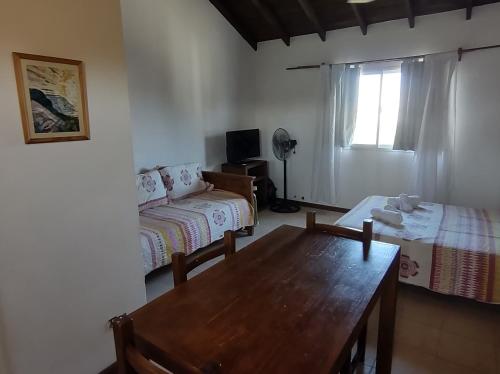 Ένα ή περισσότερα κρεβάτια σε δωμάτιο στο Hola!