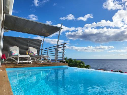 Πισίνα στο ή κοντά στο Blue Haven Villa 1