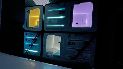 a close up of a control panel with a bed at Hotel Cápsula Bogotá Castellana in Bogotá