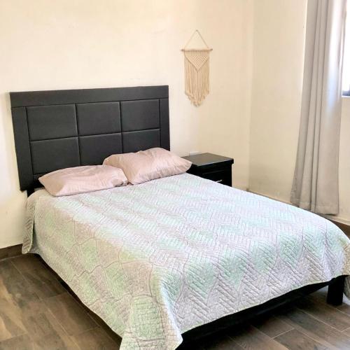 Postel nebo postele na pokoji v ubytování Apartment in Rufino Tamayo