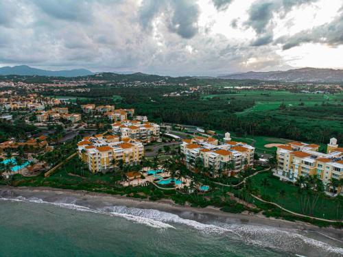 an aerial view of a resort next to the water at Luxury Beach Front Condo Balcony Pool and Jacuzzi in Buena Vista