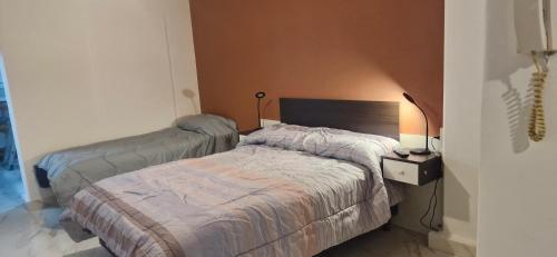 En eller flere senge i et værelse på Tiempos patagónicos de reflexión