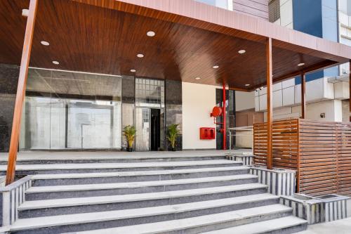 a group of stairs in front of a building at Townhouse OAK XOTEL near silk board metro in Bengaluru