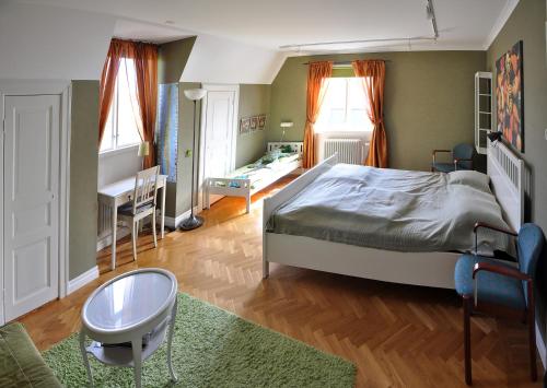 Postel nebo postele na pokoji v ubytování Villa Ekebo Bed & Kitchen