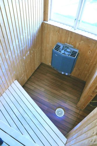 an inside view of a sauna with a fan at Villa Ekebo Bed & Kitchen in Borgholm
