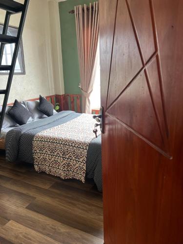 Postel nebo postele na pokoji v ubytování Rustique House dbl