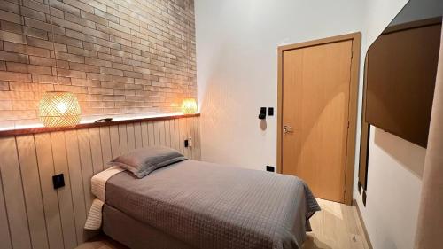 Postel nebo postele na pokoji v ubytování Chalés Arco-Íris