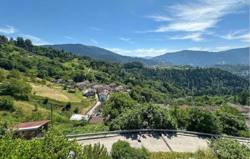 a view of a village in the mountains at Beautiful Home In Sovramonte With Wifi in Sovramonte